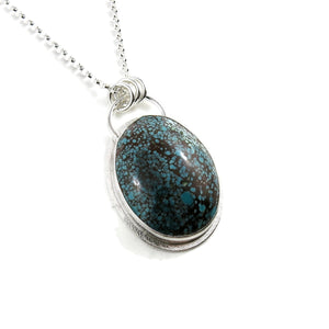 Speckled blue and brown Hubei turquoise pendant in sterling silver by Mikel Grant Jewellery.