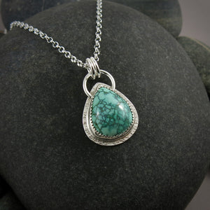 Spiderweb turquoise pendant in sterling silver by Mikel Grant Jewellery.