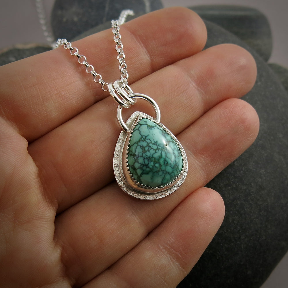 Spiderweb turquoise pendant in sterling silver by Mikel Grant Jewellery.