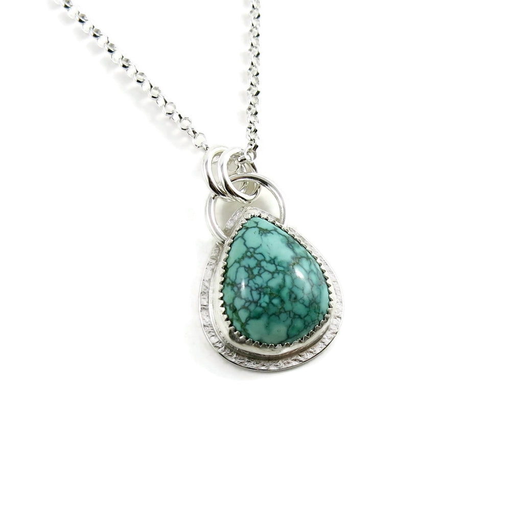 Spiderweb turquoise pendant in sterling silver by Mikel Grant Jewellery.