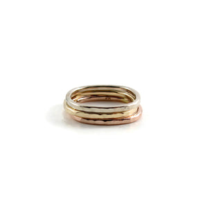 Gold square eternity band by Mikel Grant Jewellery. Yellow, rose or white gold. Hammer textured.