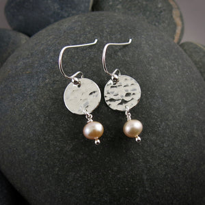 Hammered silver disc earrings with peach pearl drops by Mikel Grant Jewellery