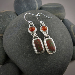  Analyzing image      Mikel-Grant-Jewellery-Sunrise-Earrings_2  2019 × 2019px  Sunrise earrings by Mikel Grant Jewellery. Baltic amber and Sonoran sunrise jasper in sterling silver.