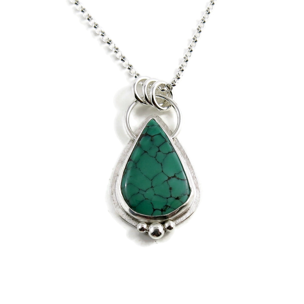 Spiderweb Hubei teardrop turquoise pendant in sterling silver by Mikel Grant Jewellery