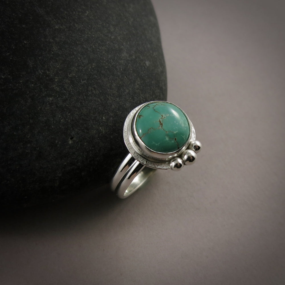 Tibetan turquoise ring in sterling silver by Mikel Grant Jewellery.  Size 8.