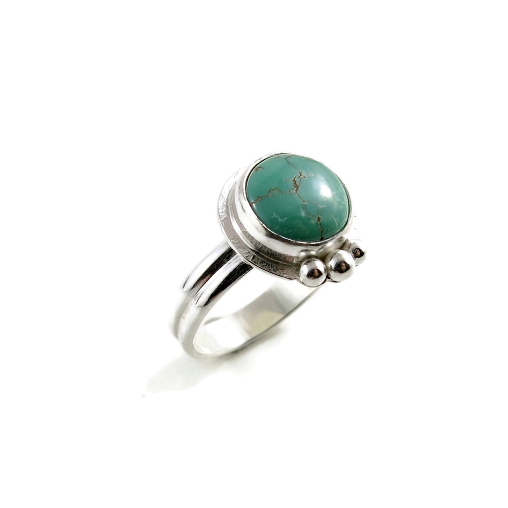 Tibetan turquoise ring in sterling silver by Mikel Grant Jewellery.  Size 8.