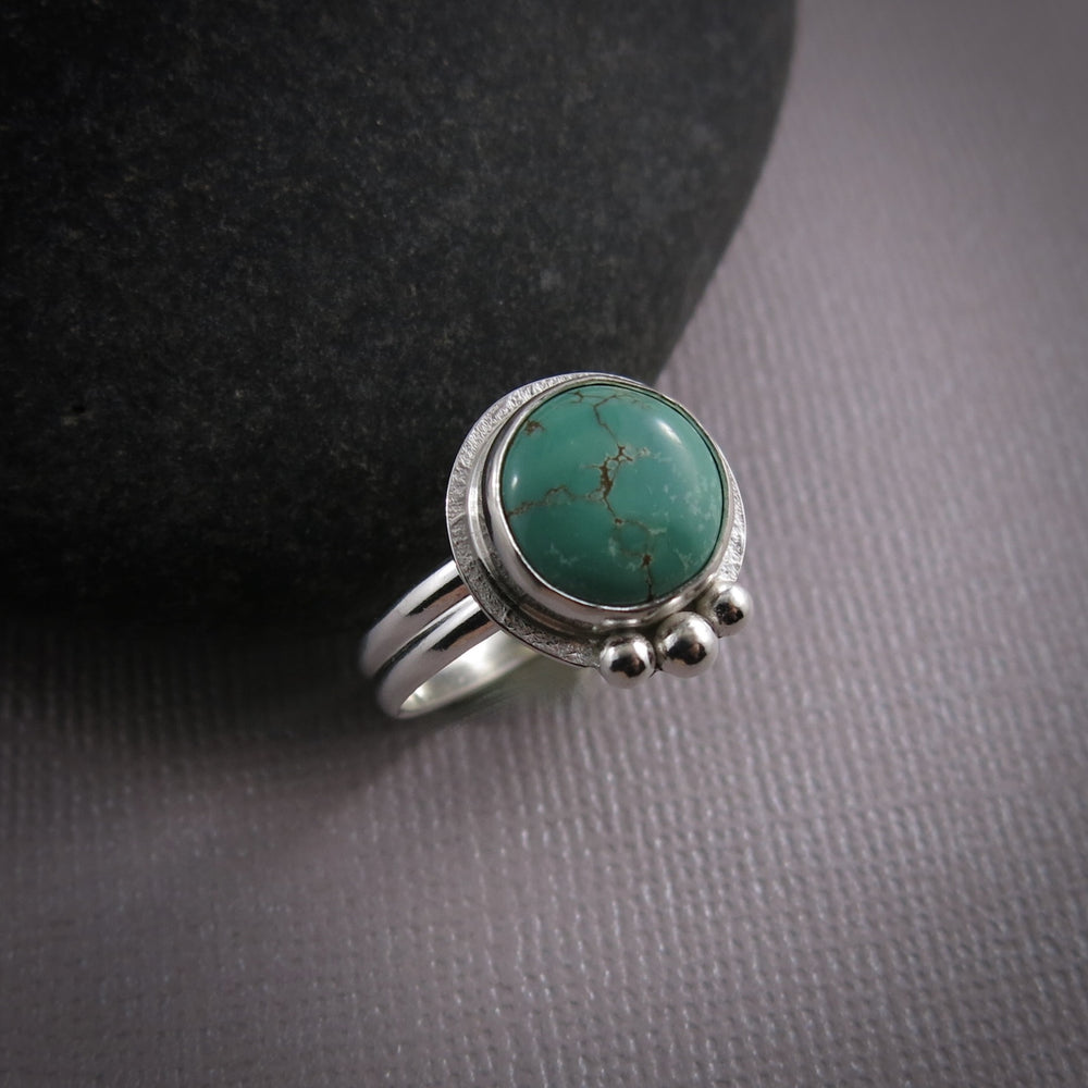 Tibetan turquoise ring in sterling silver by Mikel Grant Jewellery.  Size 8.