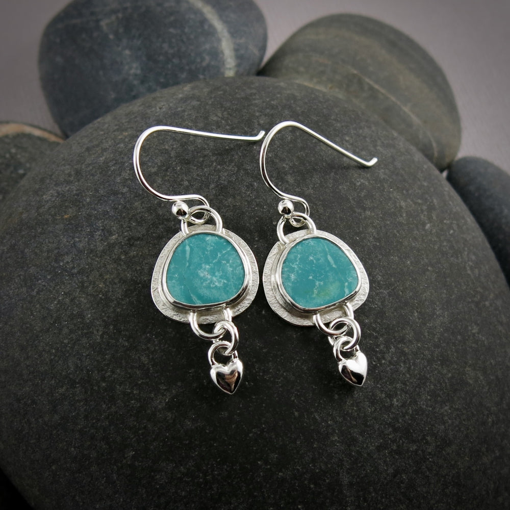 Turquoise love earrings by Mikel Grant Jewellery.  Bezel set turquoise with silver heart dangles.