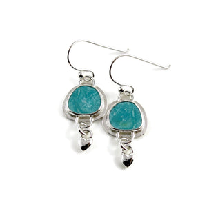 Turquoise love earrings by Mikel Grant Jewellery.  Bezel set turquoise with silver heart dangles.