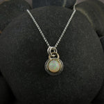 Welo opal necklace in 18K gold and sterling silver by Mikel Grant Jewellery