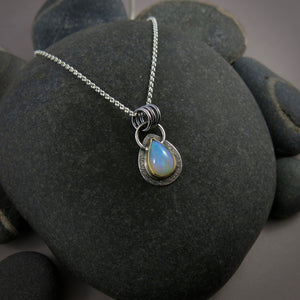Stunning Welo opal teardrop necklace in 18K gold and sterling silver by Mikel Grant Jewellery
