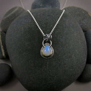 Stunning Welo opal teardrop necklace in 18K gold and sterling silver by Mikel Grant Jewellery