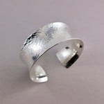 Wide hammer textured silver convex cuff bracelet by Mikel Grant Jewellery