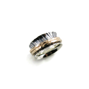 Zebra print mediation ring on oxidized silver with gold spinning bands by Mikel Grant Jewellery