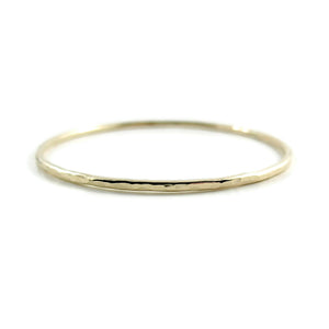 Hammered gold bangle by Mikel Grant Jewellery. Artisan made hammer textured 14K gold filled bangle bracelet.