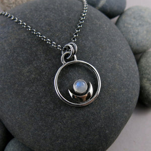 Dream Necklace by Mikel Grant Jewellery. Silver Crescent Moon Cradling a Rainbow Moonstone.