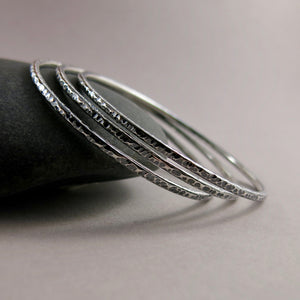 Bark textured silver bangle by Mikel Grant Jewellery.  Artisan made textured & oxidized silver bangle.