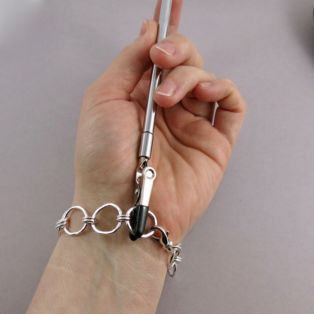 Bracelet Helper from Mikel Grant Jewellery. An easy to use tool to assist putting on bracelets by yourself.