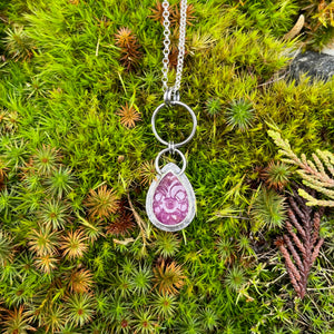 Carved ruby circle drop necklace in sterling silver by Mikel Grant Jewellery. Viva Magenta Jewellery Collection.