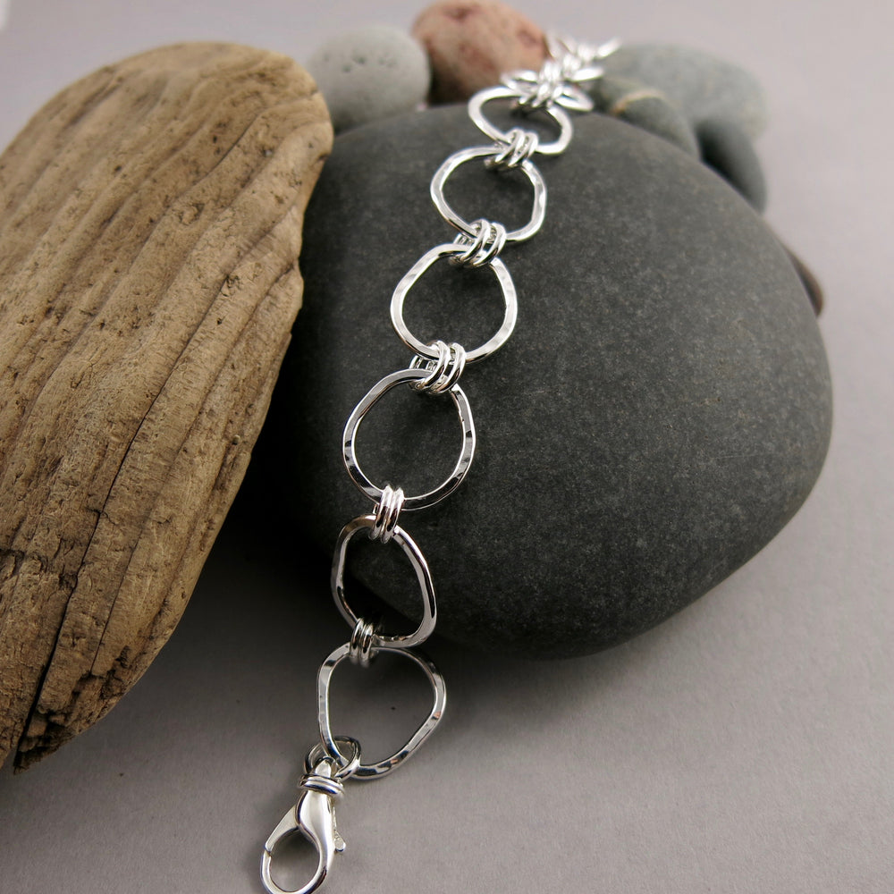 Coast Bracelet: beach inspired, artisan made.  Free form silver adjustable link bracelet with rustic hammer texture by Mikel Grant Jewellery