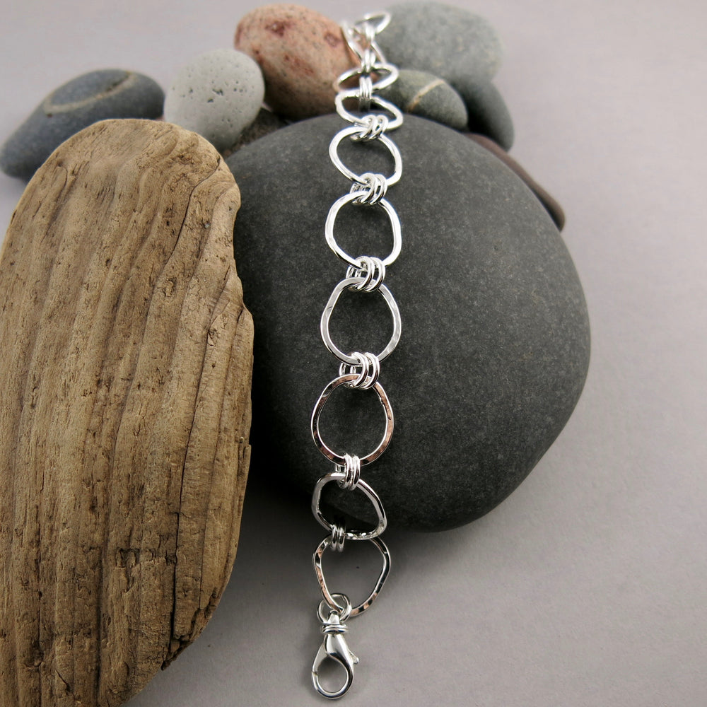 Coast Bracelet: beach inspired, artisan made. Free form silver adjustable link bracelet with rustic hammer texture by Mikel Grant Jewellery