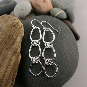 Coast Trio Drop Earrings: hammer textured free form sterling silver long statement earrings by Mikel Grant Jewellery