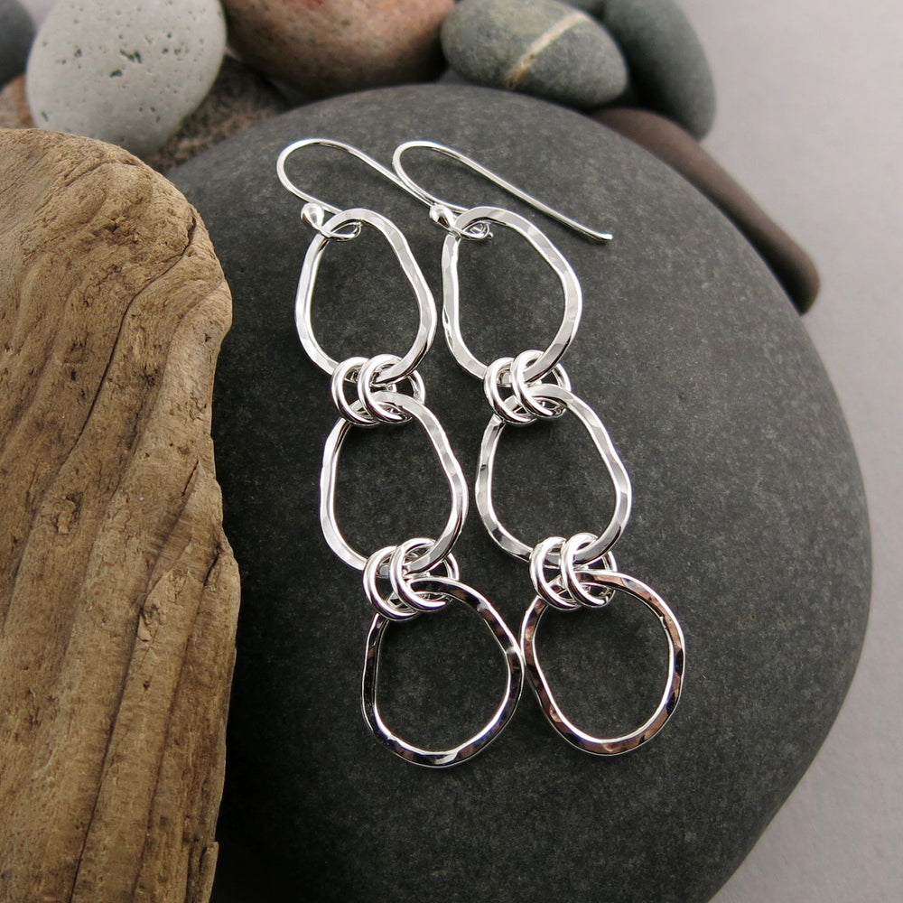 Coast Trio Drop Earrings: hammer textured free form sterling silver long statement earrings by Mikel Grant Jewellery