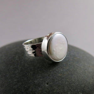 White coin pearl ring in sterling silver by Mikel Grant Jewellery.