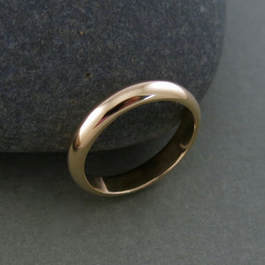 Bespoke wedding ring in 14K yellow gold by Mikel Grant Jewellery.  Simple, classic, enduring.