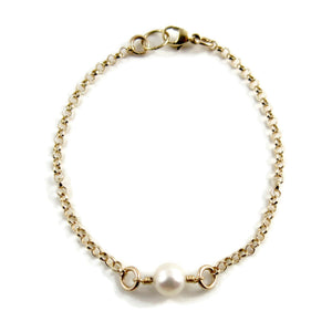 Delicate luxe single pearl bracelet in 14K gold by Mikel Grant Jewellery