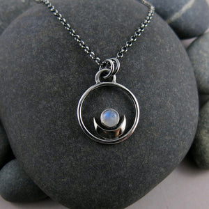 Dream Necklace by Mikel Grant Jewellery.  Silver Crescent Moon Cradling a Rainbow Moonstone.