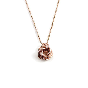 Algerian love knot necklace in 14K rose gold fill by Mikel Grant Jewellery.