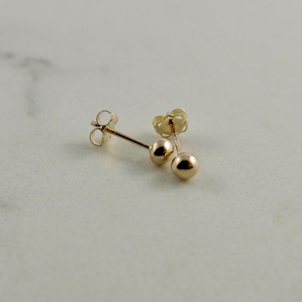 Solid gold ball studs by Mikel Grant Jewellery.