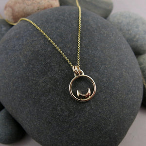 Gold dream necklace by Mikel Grant Jewellery. Solid 14K gold crescent moon charm necklace.