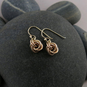 Gold eternity love knot earrings by Mikel Grant Jewellery. Solid 14K gold moveable infinite knot earrings.