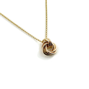 Gold eternity love knot necklace by Mikel Grant Jewellery.  Solid 14K gold moveable infinite knot necklace.
