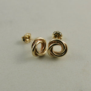 Gold love knot trio studs by Mikel Grant Jewellery.