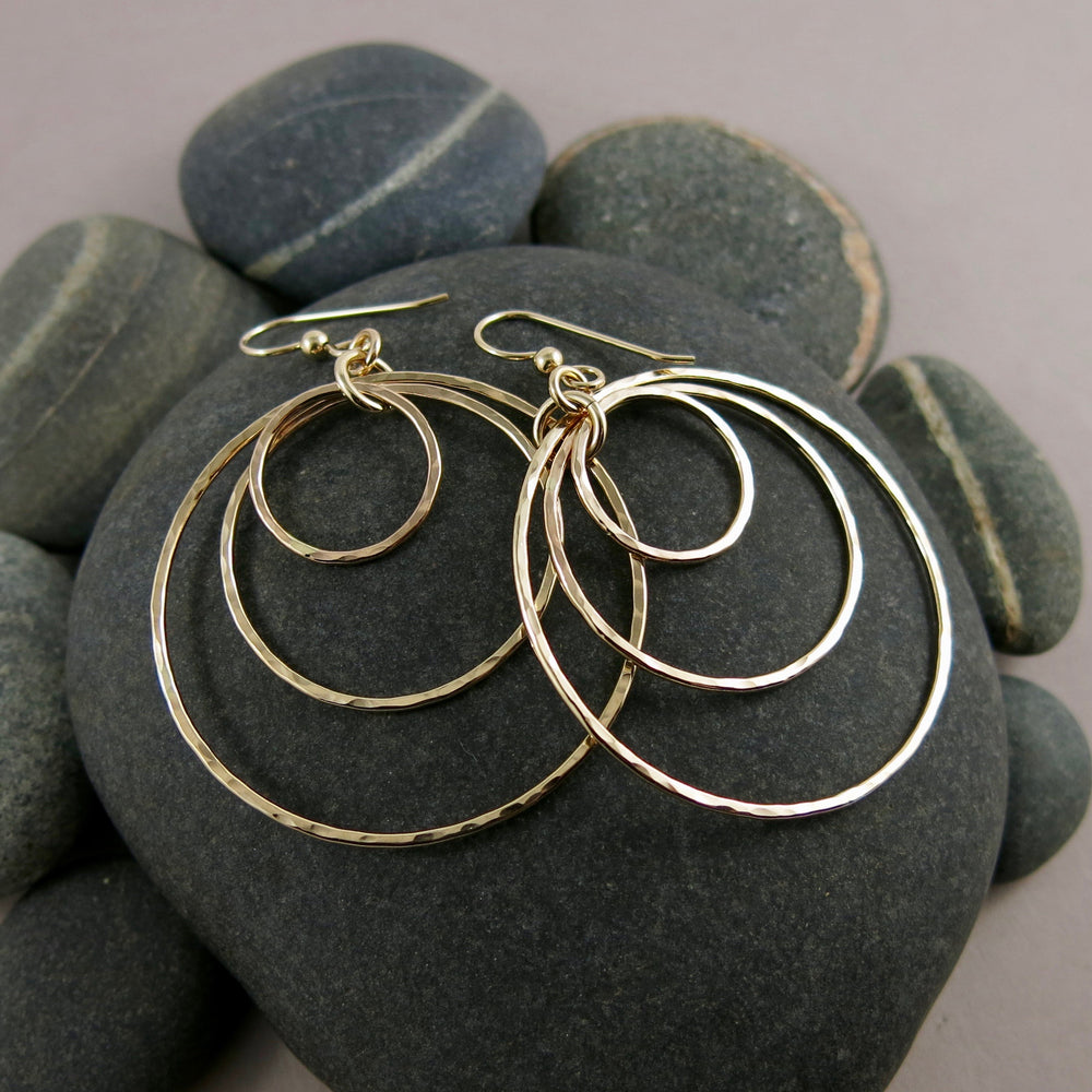 Hammered gold nesting trio circle earrings by Mikel Grant Jewellery.  Artisan made bold dangle earrings.