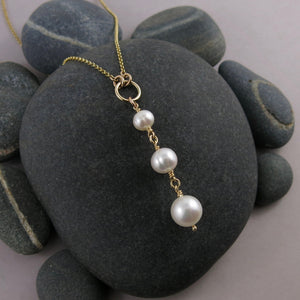 Pearl trio drop necklace in 14K gold by Mikel Grant Jewellery. Luxe wedding jewellery with white freshwater pearls.