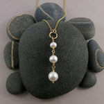 Pearl trio drop necklace in 14K gold by Mikel Grant Jewellery.  Luxe wedding jewellery with white freshwater pearls.
