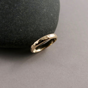 Gold steadfast ring by Mikel Grant Jewellery.  14K solid gold half round hammer textured band in medium width.  