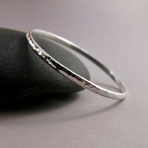 Half round hammer textured bangle bracelet by Mikel Grant Jewellery