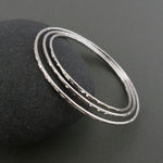 Silver hammer textured bangle by Mikel Grant Jewellery.  Artisan made sterling silver bangle.