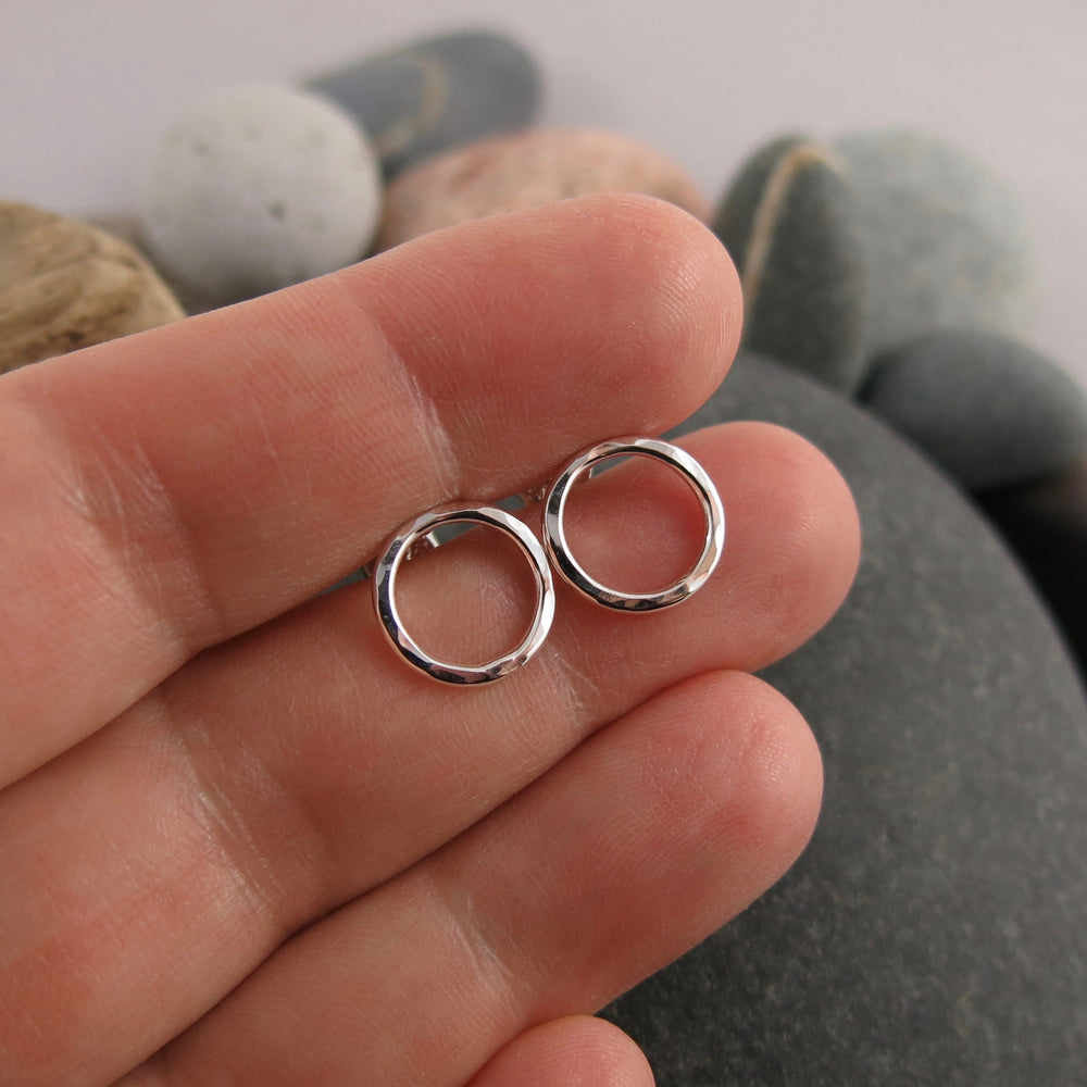Silver open circle studs by Mikel Grant Jewellery. Hammer textured silver circle studs.