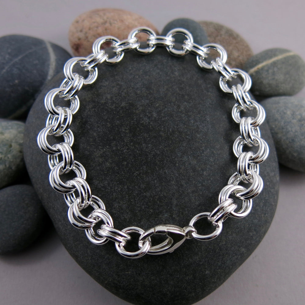 Artisan made heavy double chain link bracelet is silver by Mikel Grant Jewellery.