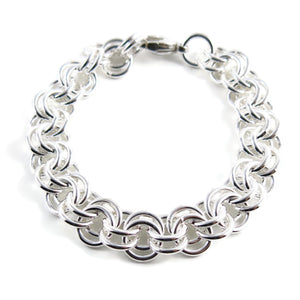 Artisan made heavy double chain link bracelet is silver by Mikel Grant Jewellery.