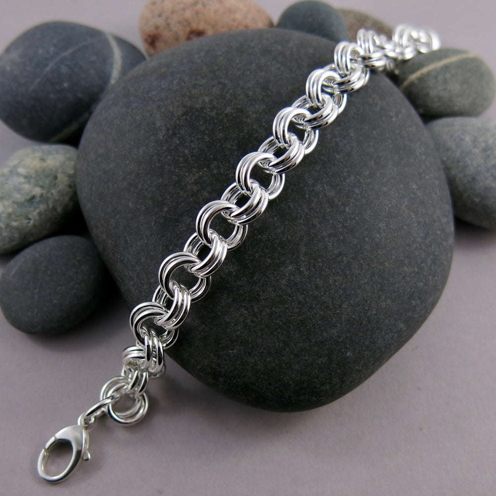 Artisan made heavy double chain link bracelet is silver by Mikel Grant Jewellery.