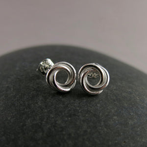 Silver love knot trinity stud earrings by Mikel Grant Jewellery.  Artisan made trio knot studs.