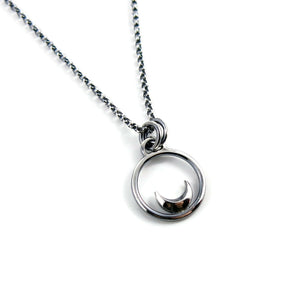 Mini silver crescent moon dream necklace by Mikel Grant Jewellery.