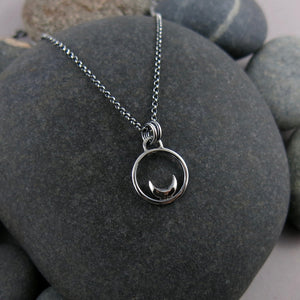 Mini silver crescent moon dream necklace by Mikel Grant Jewellery.